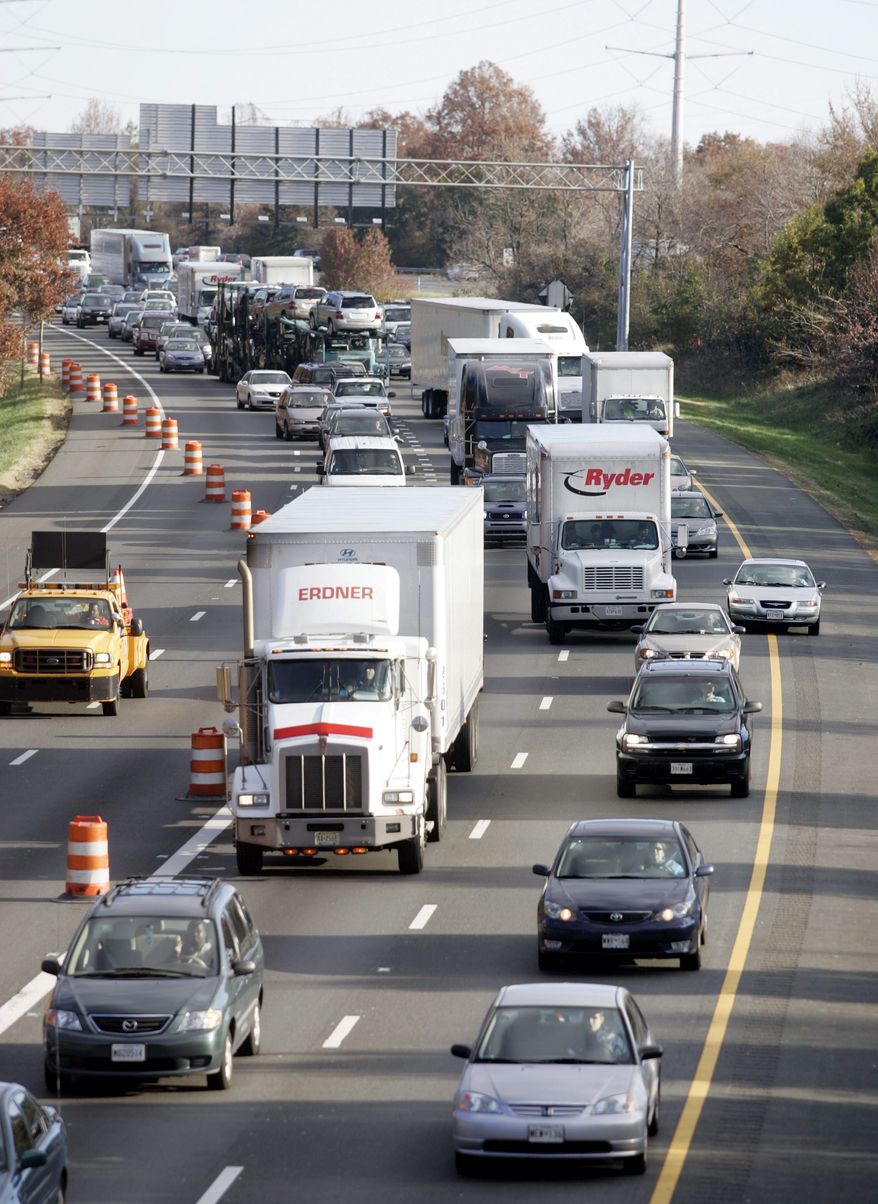 **FILE** Traffic on Interstate 95 near the Capital Beltway exit in Beltsville, Md. (Associated Press)