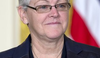 **FILE** Gina McCarthy stands on stage in the East Room of the White House in Washington on March 4, 2013, as President Obama announced he would nominate McCarthy to head the EPA. (Associated Press)