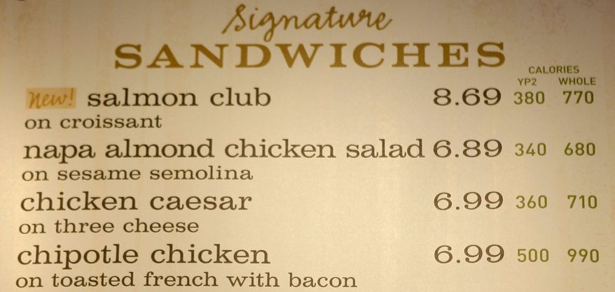 ** FILE ** In this March 8, 2010, file photo, the sandwich board at the Panera store in Brookline, Mass., shows the calorie count for each item. Diners will have to wait a little longer to find calorie counts on most restaurant chain menus, in supermarkets and on vending machines. (AP Photo/Charles Krupa, File)