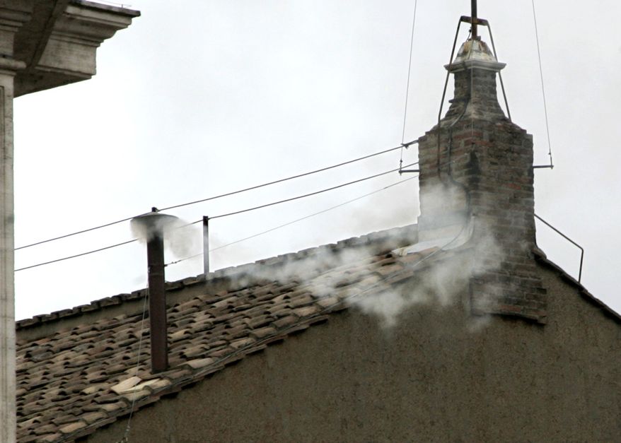 ** FILE ** White smoke billows from the chimney atop the Sistine Chapel at the Vatican on April 19, 2005, to announce the election of Cardinal Joseph Ratzinger of Germany as Pope Benedict XVI. (AP Photo/Pier Paolo Cito)