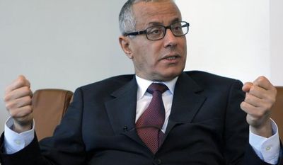 **FILE** Ali Zeidan, a Europe-based envoy for the Libyan National Transitional Council, speaks to the Associated Press in Paris on March, 21, 2011. (Associated Press)