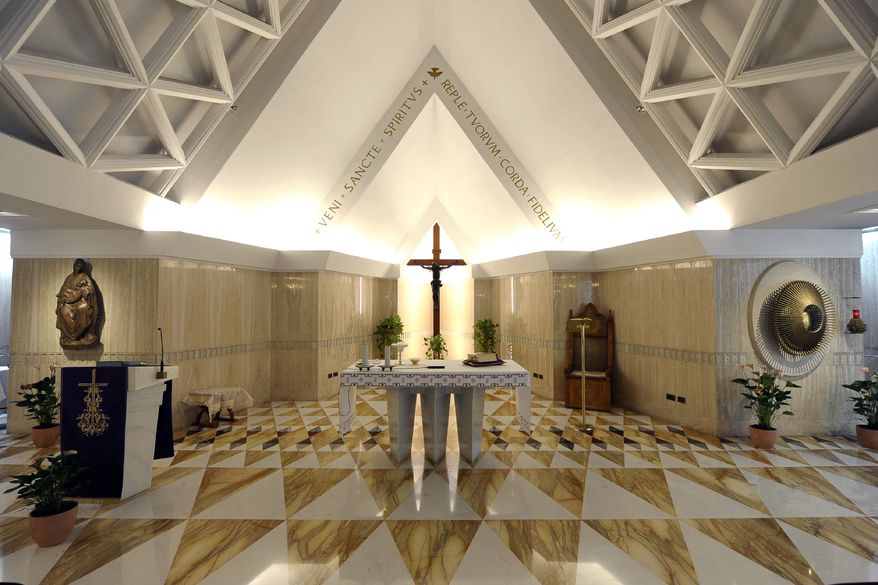 This photo provided by the Vatican newspaper L'Osservatore Romano Saturday, March 9, 2013, shows the chapel of Vatican's Santa Marta hotel where the cardinals were sequestered once the conclave began. (AP Photo/L'Osservatore Romano, ho)