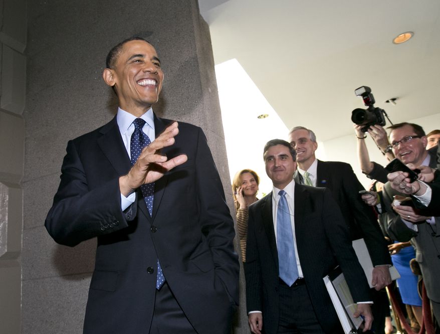 President Obama turns to reporters as he leaves Capitol Hill in Washington on Wednesday, March 13, 2013, after his closed-door meeting with House Republicans to discuss the budget. (AP Photo/J. Scott Applewhite)