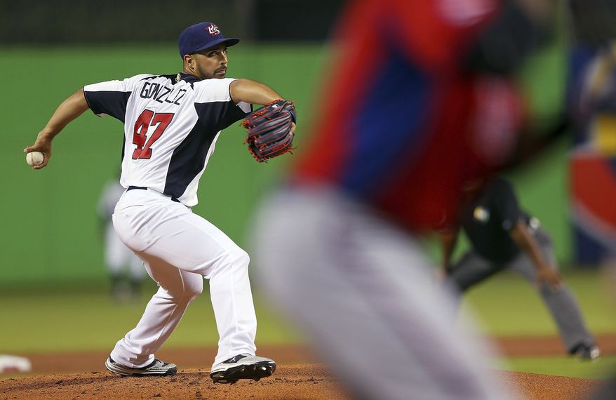 United States' Gio Gonzalez delivers a pitch during a World Baseball Classic second-round game against Puerto Rico, Tuesday, March 12, 2013, in Miami. The United States won 7-1. (AP Photo /Mike Ehrmann, Pool)