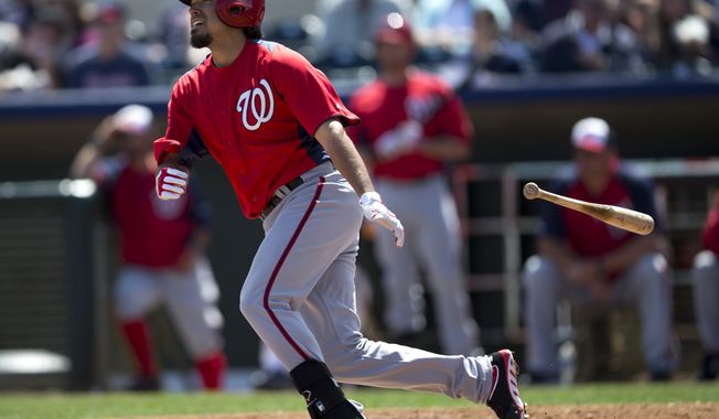 Washington Nationals Anthony Rendon bats during the first inning of an exhibition spring training baseball game against the Houston Astros on Wednesday, March 13, 2013, in Kissimmee, Fla. (AP Photo/Evan Vucci)
