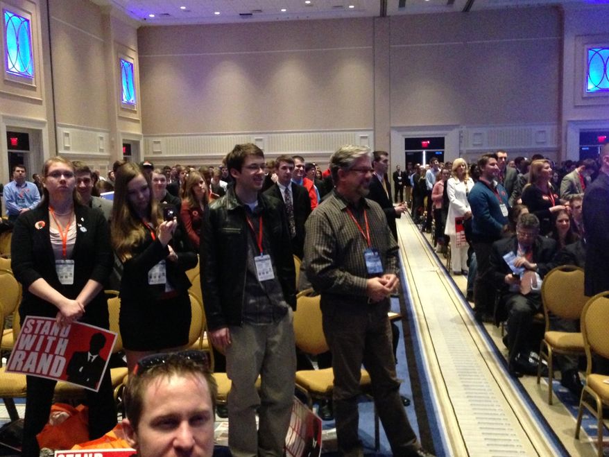 Many in the audience kept standing during Sen. Rand Paul's speech at the 40th annual Conservative Political Action Conference in National Harbor, Md., Thursday, March 14, 2013. (David S. Jackson/The Washington Times)