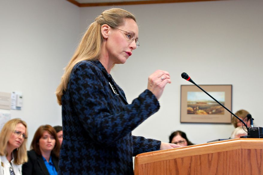 **FILE** Rep. Bette Grande testifies before the House Human Services Committee in Bismarck, N.D., on Jan. 31, 2013. (Associated Press)