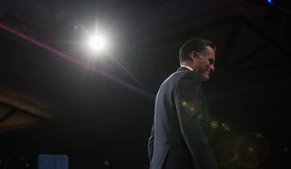 ** FILE ** Mitt Romney leaves the stage after he speaks at this year&#39;s Conservative Political Action Conference (C.P.A.C.) held at the Gaylord National Hotel, National Harbor, Md., Friday, March 15, 2013. (Andrew S. Geraci/The Washington Times)