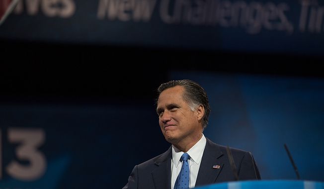 Mitt Romney peers into the audience before he speaks at the Conservative Political Action Conference at the Gaylord National Hotel in National Harbor, Md., on Friday, March 15, 2013. (Andrew S. Geraci/The Washington Times)