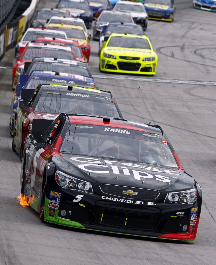 Kasey Kahne (5) leads the field during the NASCAR Sprint Cup Series Food City 500 auto race on Sunday, March 17, 2013, in Bristol, Tenn. (AP Photo/Wade Payne)