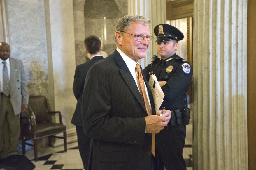 **FILE** Sen. James Inhofe of Oklahoma, the top Republican on the Senate Armed Services Committee, leaves the Senate chamber at the Capitol in Washington on Feb. 14, 2013. (Associated Press)