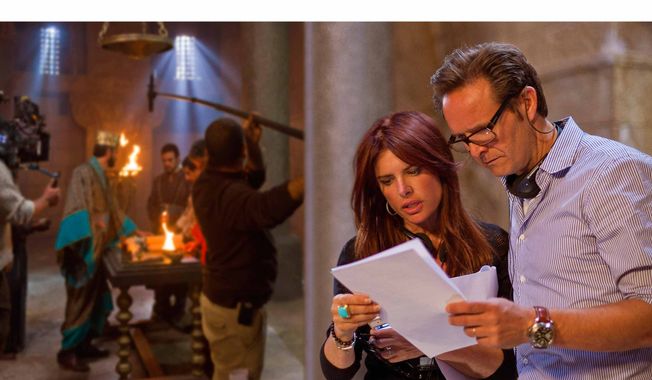 Executive producers Mark Burnett and Roma Downey are pictured on the set of &quot;The Bible.&quot; (PRNewsFoto/The History Channel) ** FILE **

