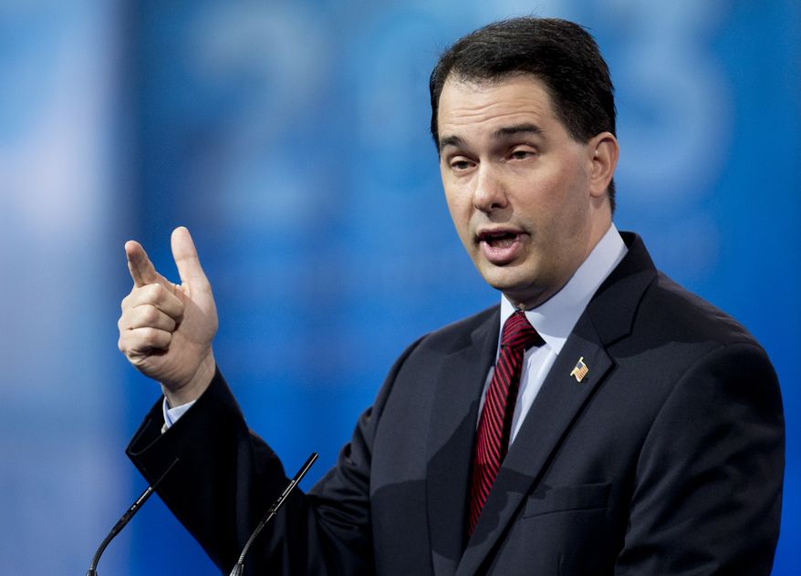Wisconsin Gov. Scott Walker speaks at the 40th annual Conservative Political Action Conference in National Harbor, Md., on Saturday, March 16, 2013. (AP Photo/Carolyn Kaster)