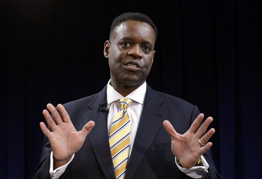 ** FILE ** Kevyn Orr answers a question during a news conference in Detroit on Thursday, March 14, 2013. (AP Photo/Paul Sancya)