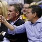 Washington Redskins owner Dan Snyder, right, watches a Phoenix Suns versus Los Angeles Lakers matchup with Redskins head coach Mike Shanahan in the second half of an NBA basketball game on Monday, March 18, 2013, in Phoenix. The Suns defeated the Lakers 99-76. (AP Photo/Ross D. Franklin)