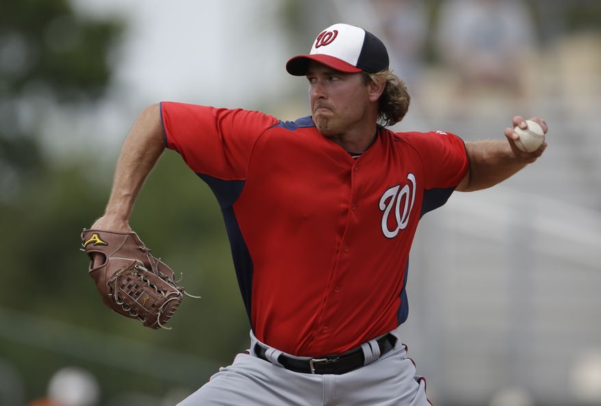 Washington Nationals pitcher Zach Duke throws during the sixth inning of an exhibition spring training baseball game against the Miami Marlins Wednesday, March 20, 2013, in Jupiter, Fla. (AP Photo/Jeff Roberson)