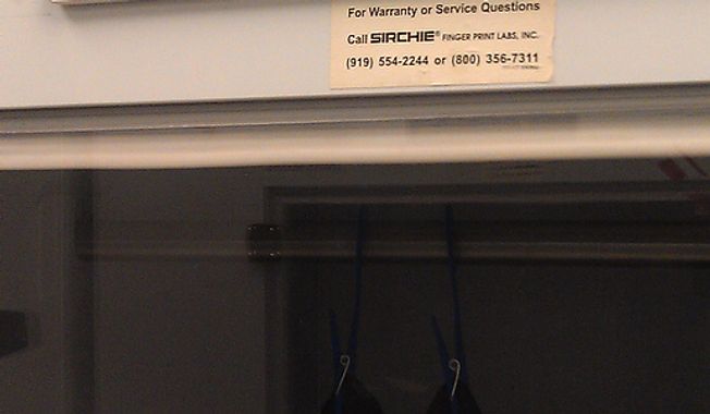 Blood-soaked clothing seized as evidence from crime scenes dries in an unsealed environment because clogged filters prevent ventilation in blood-drying cabinets. Clogged filters cause ventilation system alarms to go off "24/7," according to internal emails.