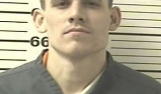 ** FILE ** Paroled inmate Evan Spencer Ebel, pictured in an undated photo, led Texas authorities on a 100-mph car chase that ended in a shootout on Thursday, March 21, 2013, and may be linked to the slaying of Colorado&#39;s state prison chief on Tuesday. (AP Photo/Colorado Department of Corrections)