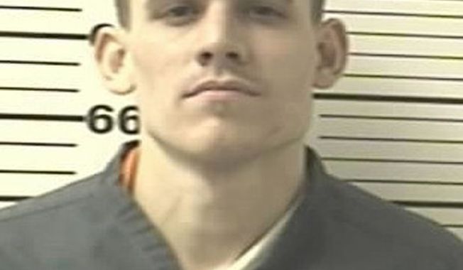 ** FILE ** Paroled inmate Evan Spencer Ebel, pictured in an undated photo, led Texas authorities on a 100-mph car chase that ended in a shootout on Thursday, March 21, 2013, and may be linked to the slaying of Colorado&#x27;s state prison chief on Tuesday. (AP Photo/Colorado Department of Corrections)