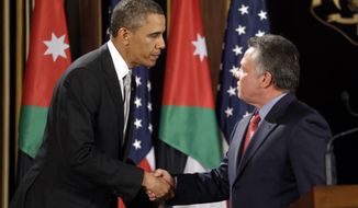 President Obama and Jordan King Abdullah II shake hands following their joint new conference at the King&#39;s Palace in Amman, Jordan, on March 22, 2013. (Associated Press)
