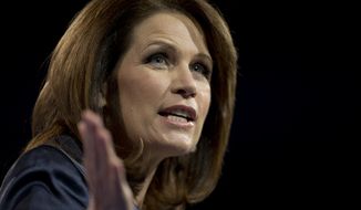**FILE** Rep. Michele Bachmann, Minnesota Republican, speaks at the 40th annual Conservative Political Action Conference in National Harbor, Md., on March 16, 2013. (Associated Press)