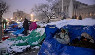 LGBT supporters camp outside of the U.S. Supreme Court in anticipation of the oral arguments on Hollingsworth vs. Perry and Windsor vs. United States, Washington, D.C., Monday, March 25, 2013. (Andrew Harnik/The Washington Times)