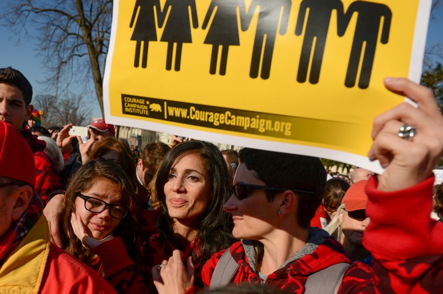 Vanessa Torres (center) and her fiance Rachel Broussard (right) of Hampton, Va., console Vanessa's daughter Gabriela, 12, as they listen to speakers during a rally for marriage equality outside the Supreme Court in Washington as the justices begin hearing two days of arguments in cases involving gay marriage on March 26, 2013. Torres and Broussard each have two children from previous marriages and are getting married in August. (Andrew Harnik/The Washington Times)