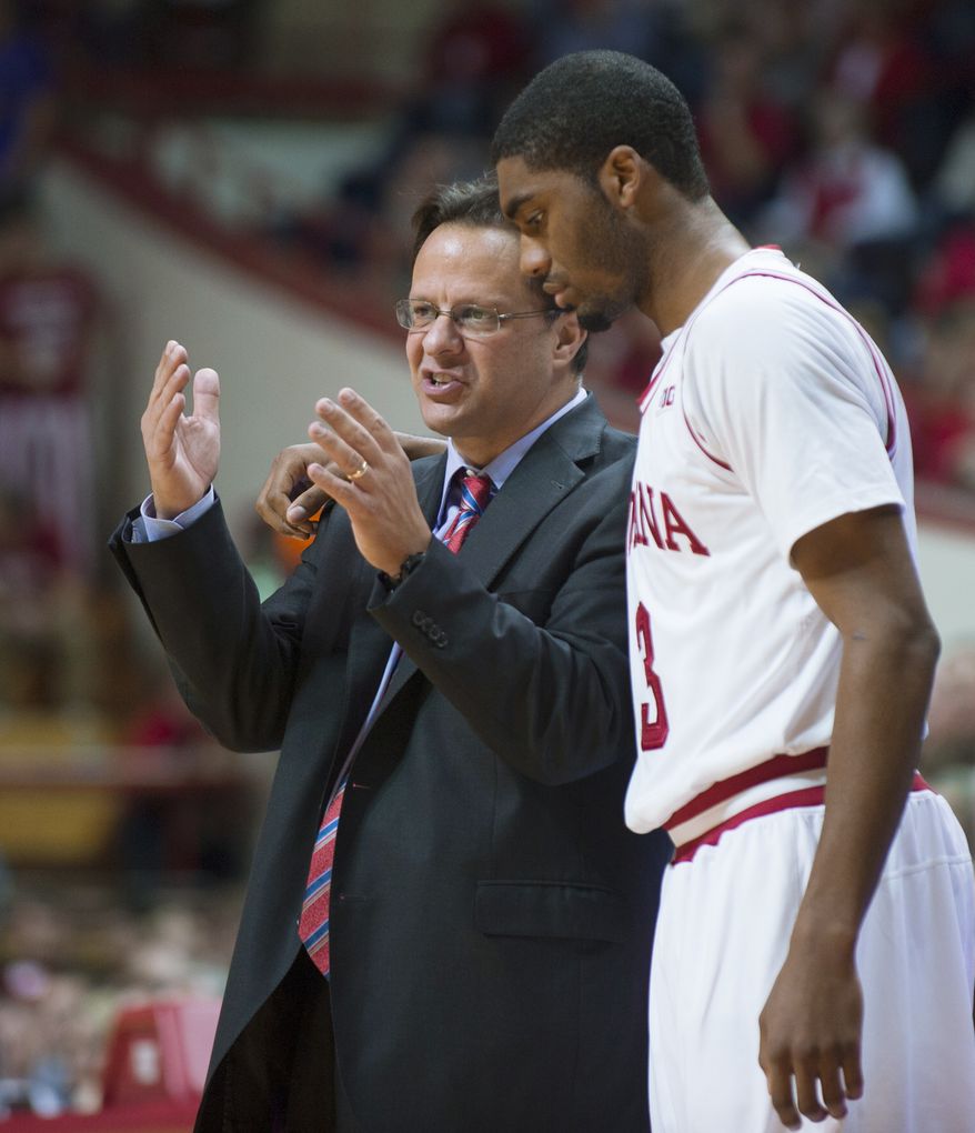 **FILE** Indiana coach Tom Crean talks with Maurice Creek during the second half of an NCAA college basketball game Saturday, Dec. 1, 2012, in Bloomington, Ind. Indiana defeated Coppin State 87-51. (AP Photo/Doug McSchooler)