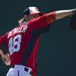 Washington Nationals pitcher Ross Detwiler warms up before the start of an exhibition spring training baseball game against the Atlanta Braves on Wednesday, March 27, 2013, in Viera, Fla. (AP Photo/Evan Vucci)