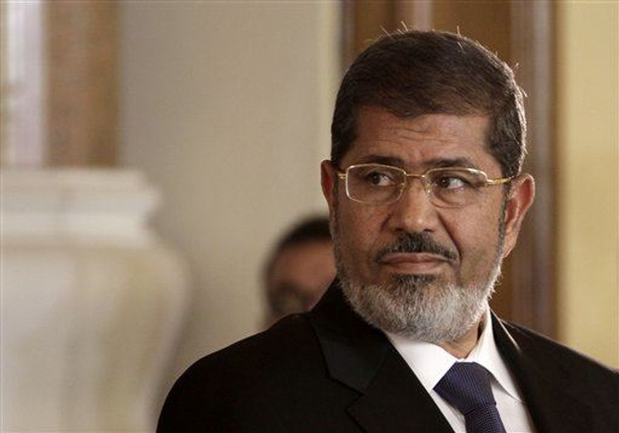 ** FILE ** Deposed Egyptian President Mohammed Morsi (AP Photo/Maya Alleruzzo)