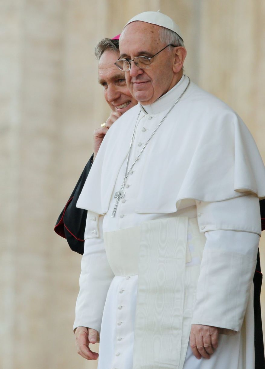 Pope Francis is flanked by Archbishop George Gaenswein, prefect of the papal household, during his general audience, in St. Peter's Square, at the Vatican, Wednesday, March 27, 2013. Francis has called for an end to the violence and looting that has accompanied the weekend coup in the Central African Republic in his first such appeal for peace since becoming pope. (AP Photo/Andrew Medichini)