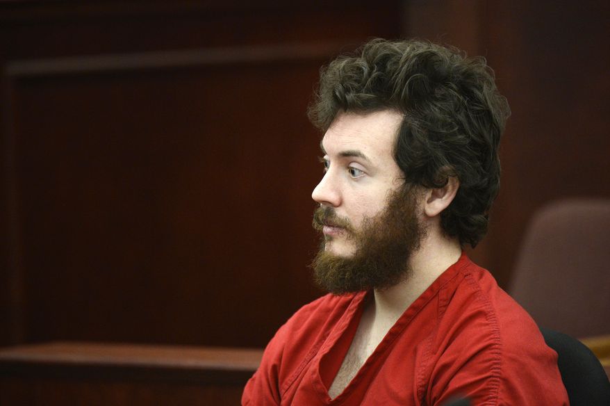 ** FILE ** Aurora, Colo., theater shooting suspect James Holmes sits in the courtroom during his arraignment in Centennial, Colo., on Tuesday, March 12, 2013. (Associated Press/Denver Post)