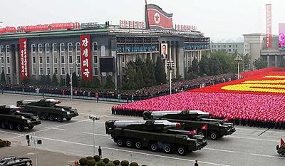 In this photo released by China&#39;s Xinhua news agency, North Korean missiles on the trucks make its way during a massive military parade to mark the 65th anniversary of the communist nation&#39;s ruling Workers&#39; Party in Pyongyang, North Korea on Sunday, Oct. 10, 2010. This year&#39;s celebration comes less than two weeks after Kim Jong Il&#39;s re-election to the party&#39;s top post and the news that his 20-something son would succeed his father and grandfather as leader. (AP Photo/Xinhua, Yao Dawei)