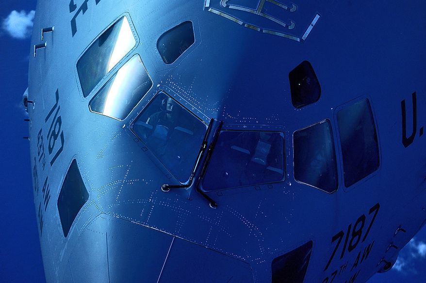 Maj. Johnathan Zito pulls in behind a KC-135 Stratotanker to receive fuel off Florida's east coast on July 12, 2012. Zito is a C-17 Globmaster III pilot with the 15th Airlift Squadron at Joint Base Charleston, S.C. The range of the KC-135 is 1,500 miles with 150,000 pounds of transfer fuel and can perform a ferry mission up to 11,015 miles. This unique asset enhances the Air Force's capability to accomplish its primary mission of global reach. (U.S. Air Force photo by Tech. Sgt. Jeremy T. Lock)