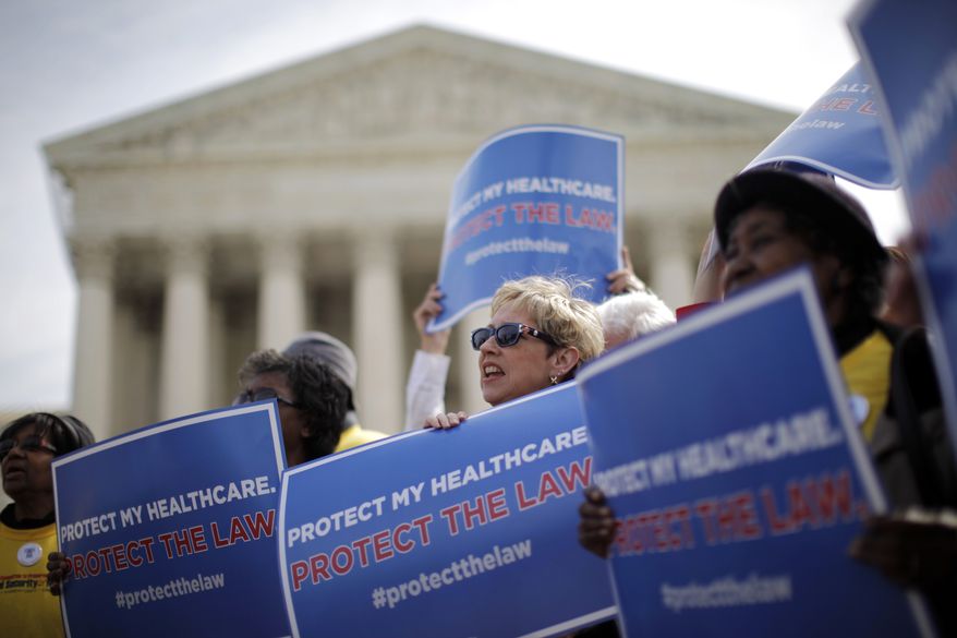 **FILE** Supporters of health care reform rally March 28, 2012, in front of the Supreme Court in Washington. (Associated Press)