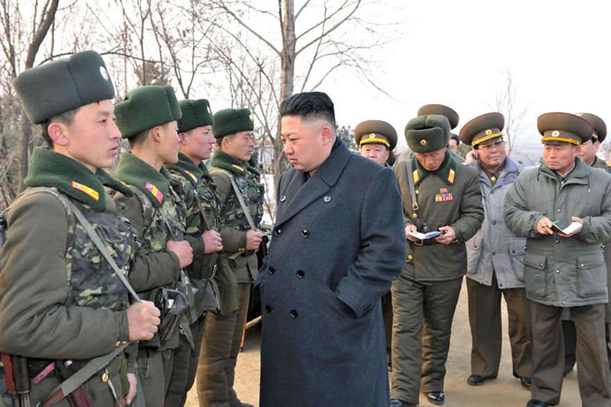 ** FILE ** Kim Jong-un inspects North Korea troops in this government photo.