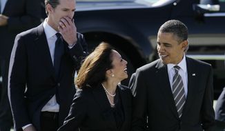 **FILE** President Obama walks with California Attorney General Kamala Harris (center) and California Lt. Gov. Gavin Newsom on Feb. 16, 2012, after arriving in San Francisco. (Associated Press)