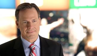 CNN&#39;s Jake Tapper works on the set of his show &quot;The Lead with Jake Tapper.&quot; (Associated Press/CNN) ** FILE **