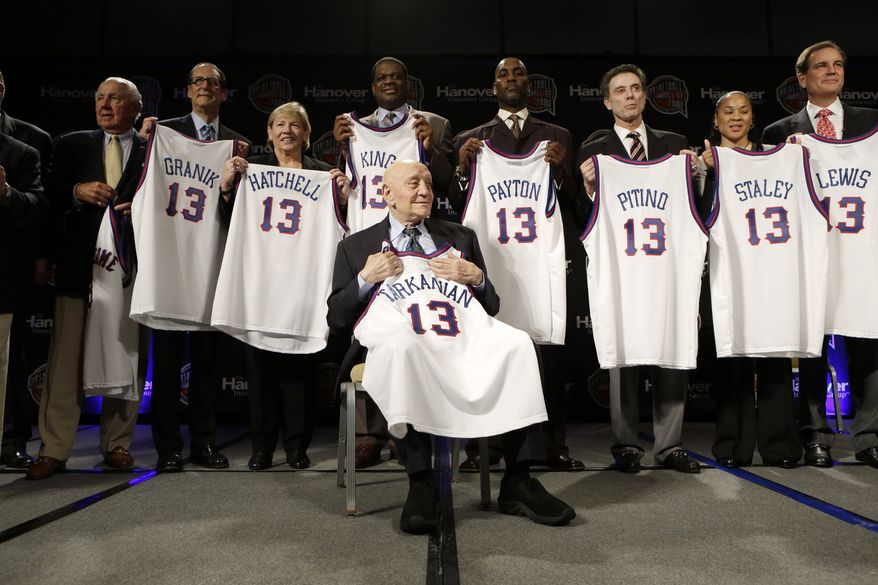 Former UNLV coach Jerry Tarkanian, front, sits in front of fellow inductees during the Naismith Memorial Basketball Hall of Fame class announcement, Monday, April 8, 2013, in Atlanta, Georgia. (AP Photo/Charlie Neibergall)