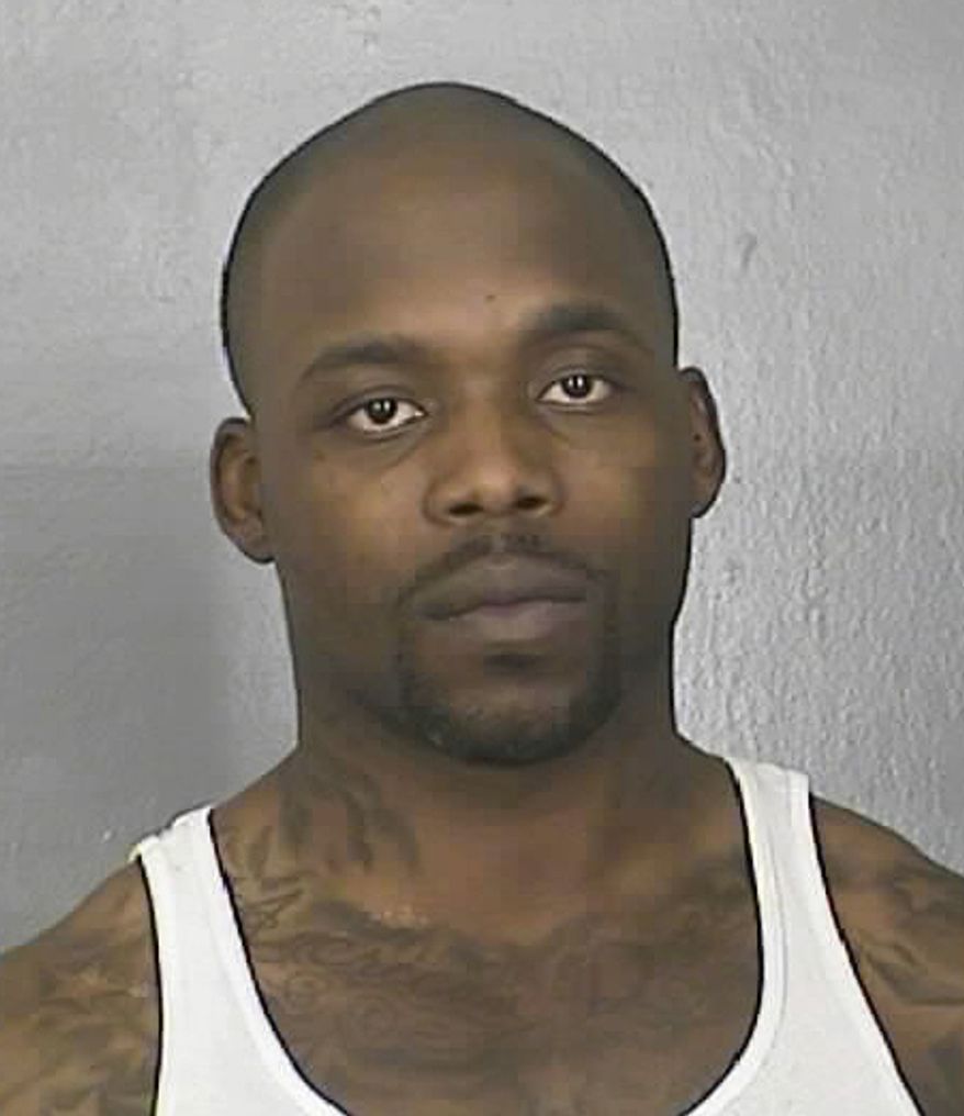 **FILE** In a photo provided by the Newport News (Va.) Police Department, Marcus Vick appears in a booking photo Monday, March 5, 2012. Vick, a former Virginia Tech and Miami Dolphins player, will spend at least 10 days in jail for ignoring court orders. Newport News Sheriff's spokeswoman Kathleen Carey says the younger brother of Philadelphia Eagles quarterback Michael Vick reported to jail on Sunday. (AP Photo/Newport News Police)