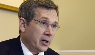 ** FILE ** In this Dec. 18, 2012, file photo, Republican U.S. Sen. Mark Kirk of Illinois speaks about his recovery from a major stroke a year ago at his home in Highland Park, Ill., In a post on his blog Tuesday, April 2, 2013,  (AP Photo/Daily Herald, Bill Zars, File)