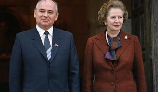 ** FILE ** In this Dec. 15, 1984, file photo, Mikhail S. Gorbachev poses with Britain&#39;s Prime Minister Margaret Thatcher in London. Ex-spokesman Tim Bell says that Thatcher has died. She was 87. Bell said the woman known to friends and foes as &quot;the Iron Lady&quot; passed away Monday morning, April 8, 2013. (AP Photo/File)