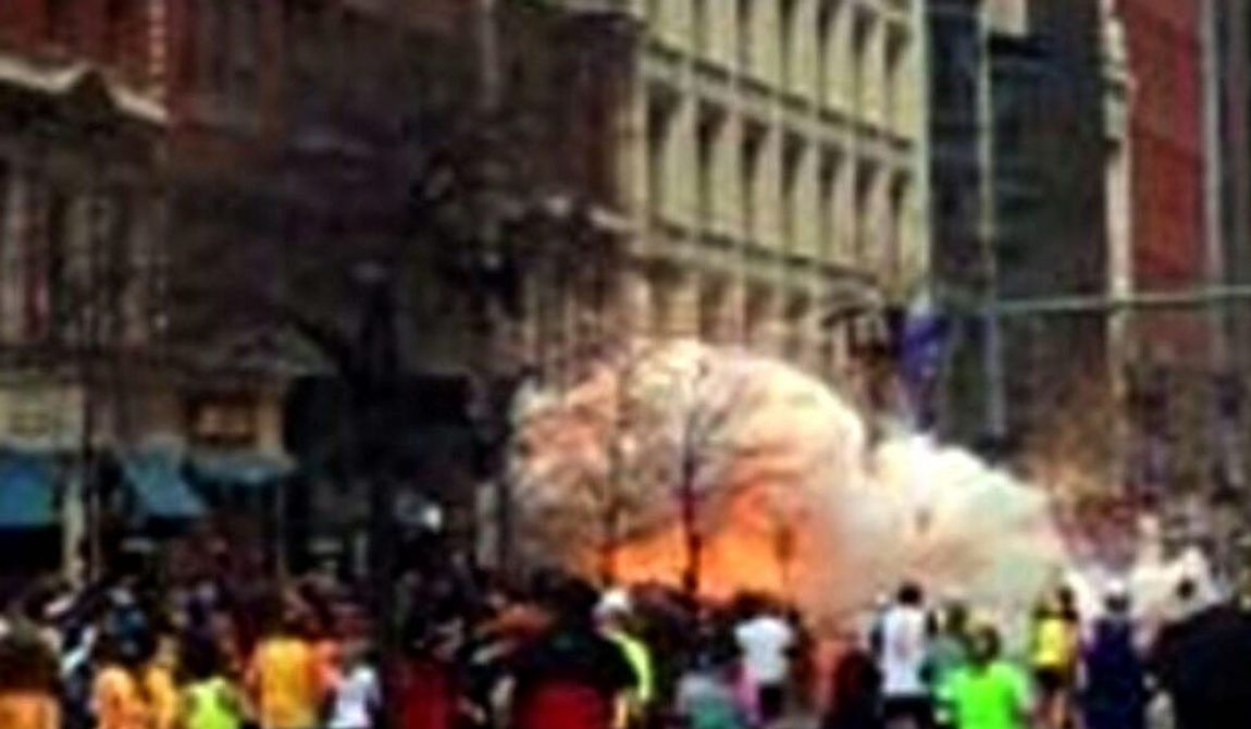 ** FILE ** In this image from video provided by WBZ TV, spectators and runners run from what was described as twin explosions that shook the finish line of the Boston Marathon, Monday, April 15, 2013, in Boston. Two explosions shattered the euphoria of the Boston Marathon finish line on Monday, sending authorities out on the course to carry off the injured while the stragglers were rerouted away from the smoking site of the blasts. (AP Photo/WBZTV)