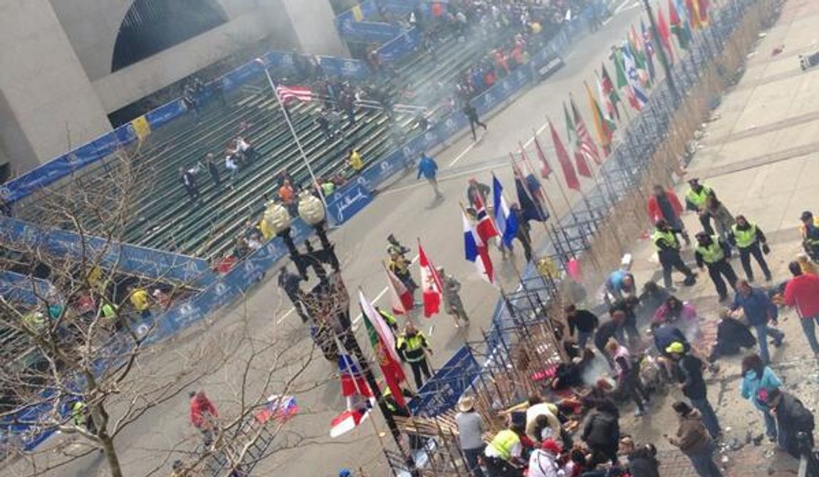 Photo of the aftermath of a suspected explosion at the finish line of the Boston Marathon. (Twitter photo/Tyler Wakstein)