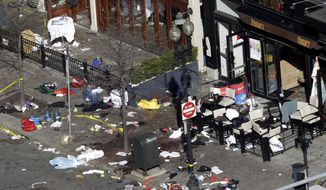 One of the blast sites on Boylston Street near the finish line of the 2013 Boston Marathon is seen in Boston on April 16, 2013, one day after bomb blasts killed three and injured more than 140 people. (Associated Press0