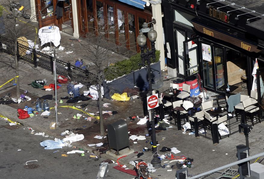 One of the blast sites on Boylston Street near the finish line of the 2013 Boston Marathon is seen in Boston on April 16, 2013, one day after bomb blasts killed three and injured more than 140 people. (Associated Press0