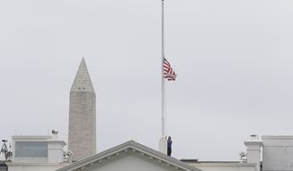 The American flag is lowered at the White House in Washington on April 16, 2013, honoring the victims of the tragedy in Boston. President Obama ordered flags at the White House and all government buildings to be flown at half-staff in honor of the Boston Marathon explosion victims. (Associated Press)