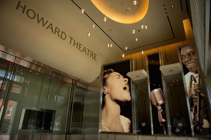 A photograph of Billie Holiday now graces the lobby of the redesigned Howard Theatre, which celebrates its first anniversary Friday with a gala hosted by D.L. Hughley (below).
