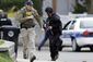 Police_Converge_Mass__tlively@washingtontimes.com_5