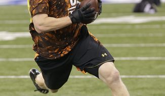 Maryland tight end Matt Furstenburg runs a drill during the NFL football scouting combine in Indianapolis, Saturday, Feb. 23, 2013. (AP Photo/Dave Martin)